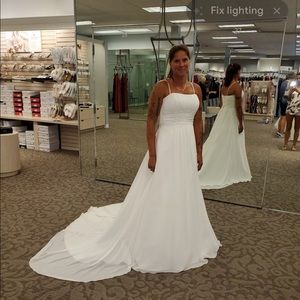 A very expensive Wedding dress 2850 OBO tsbperserved from David’s bridal